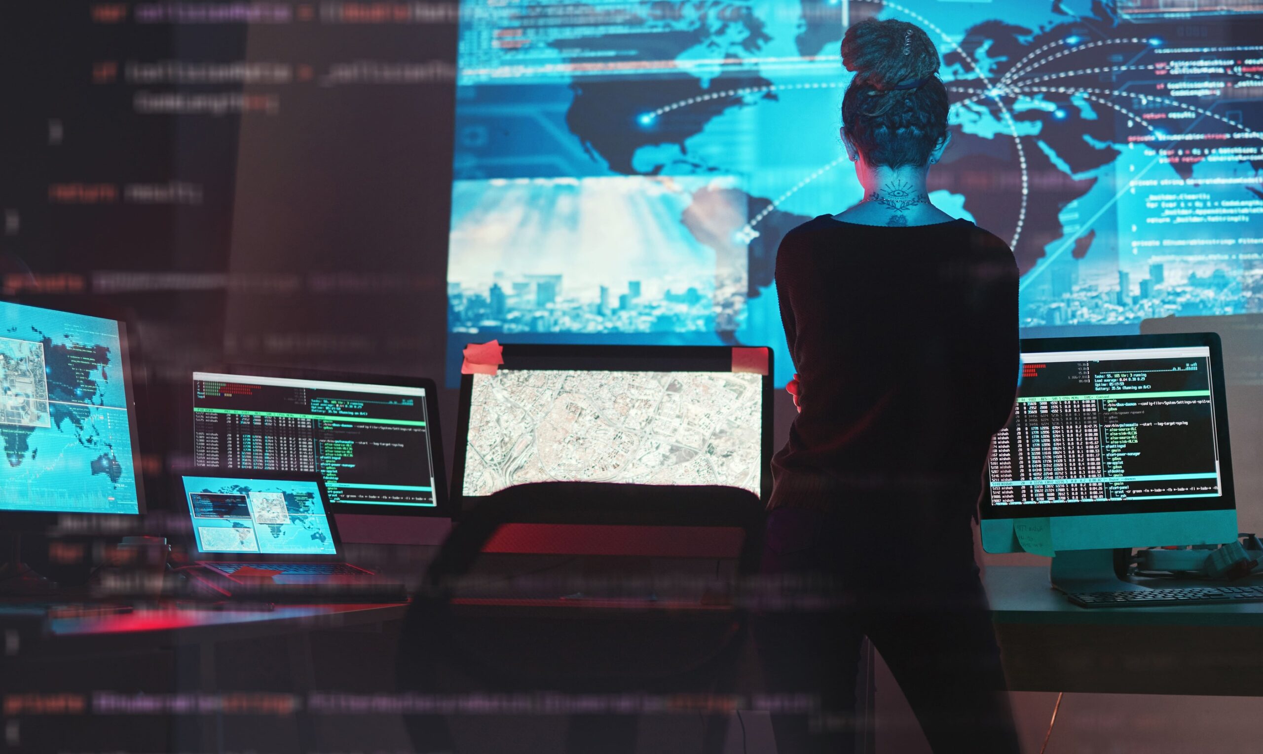 a woman looking at a computer screen