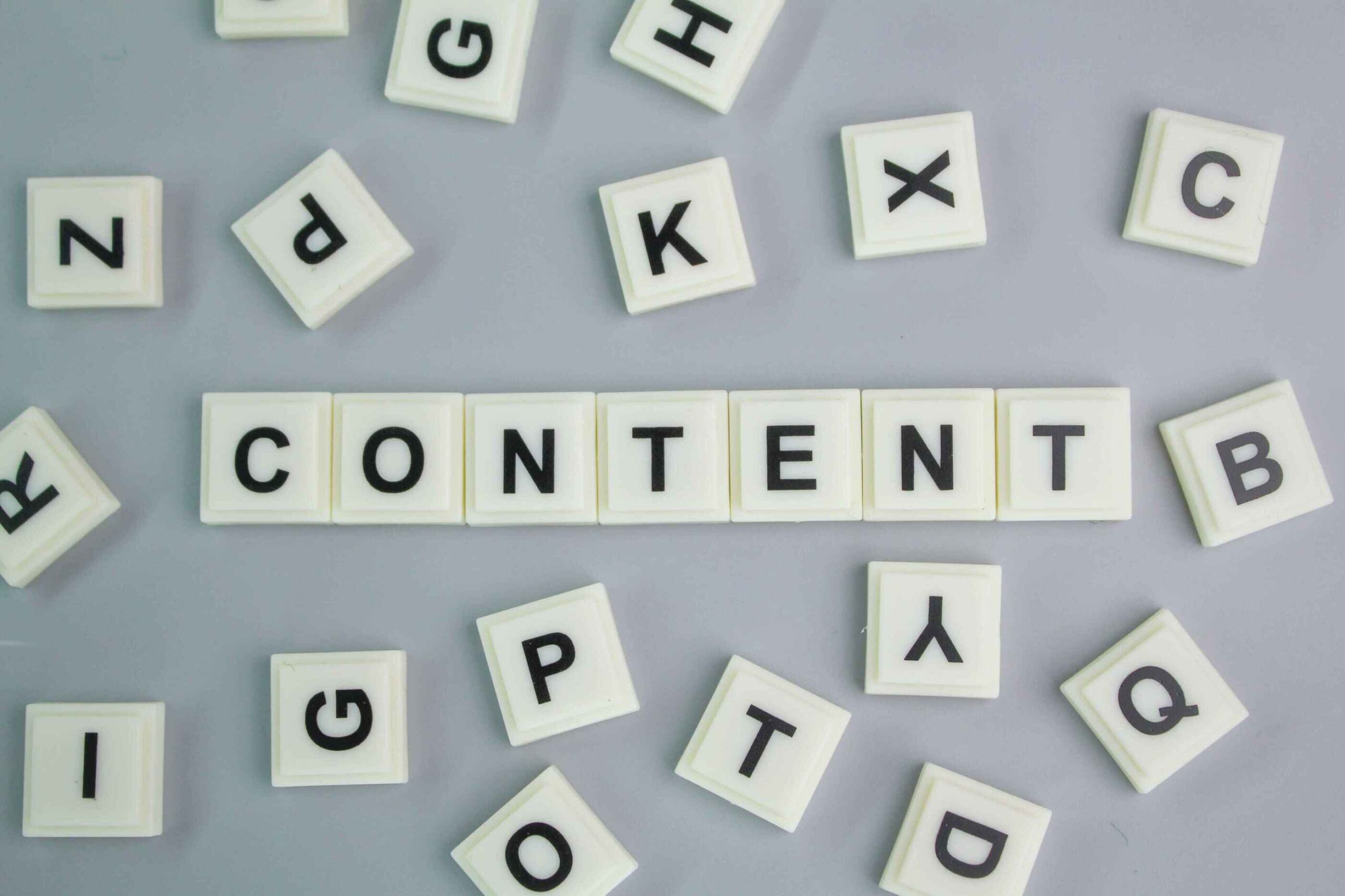 a group of white tiles with black letters