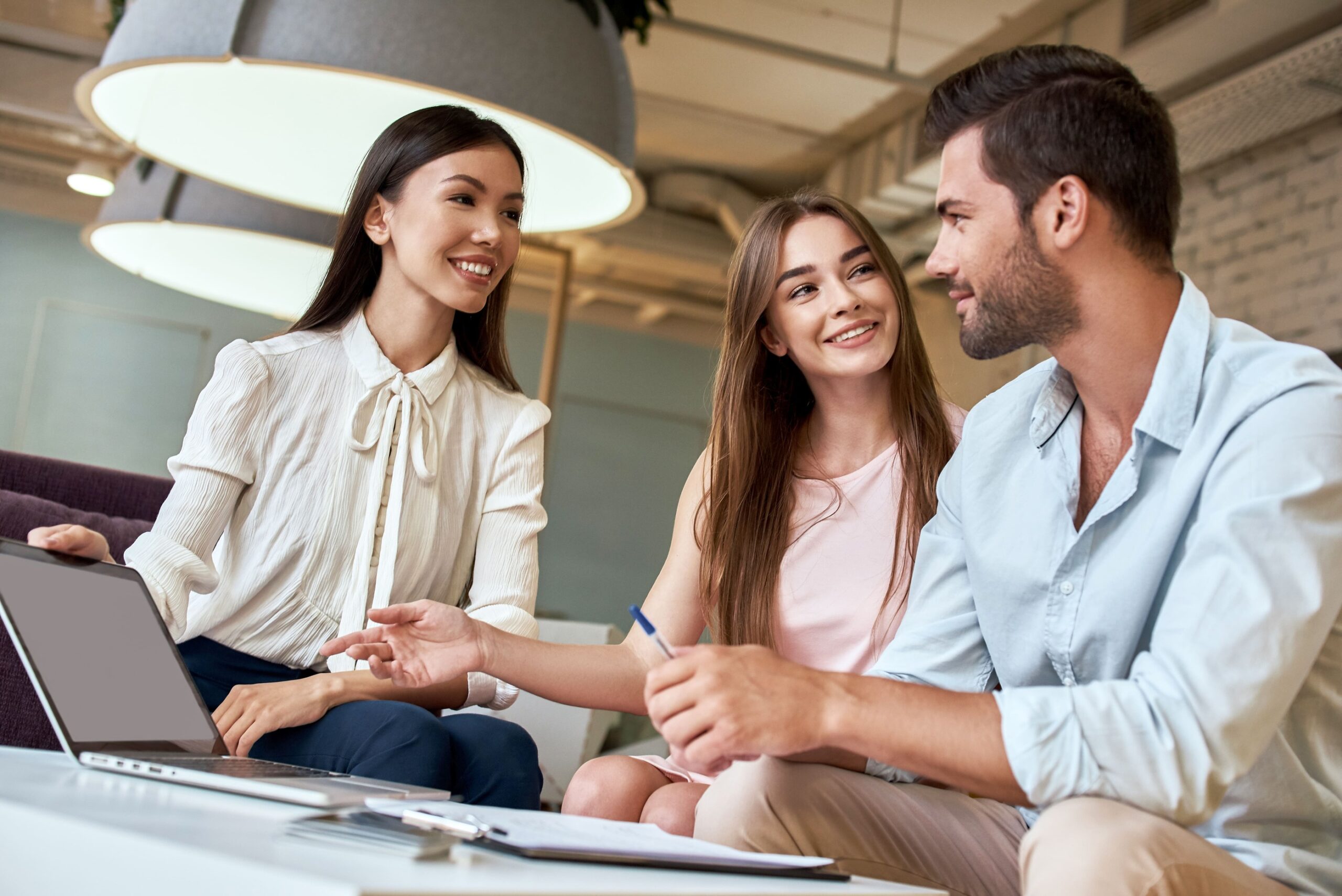 a group of people sitting and talking