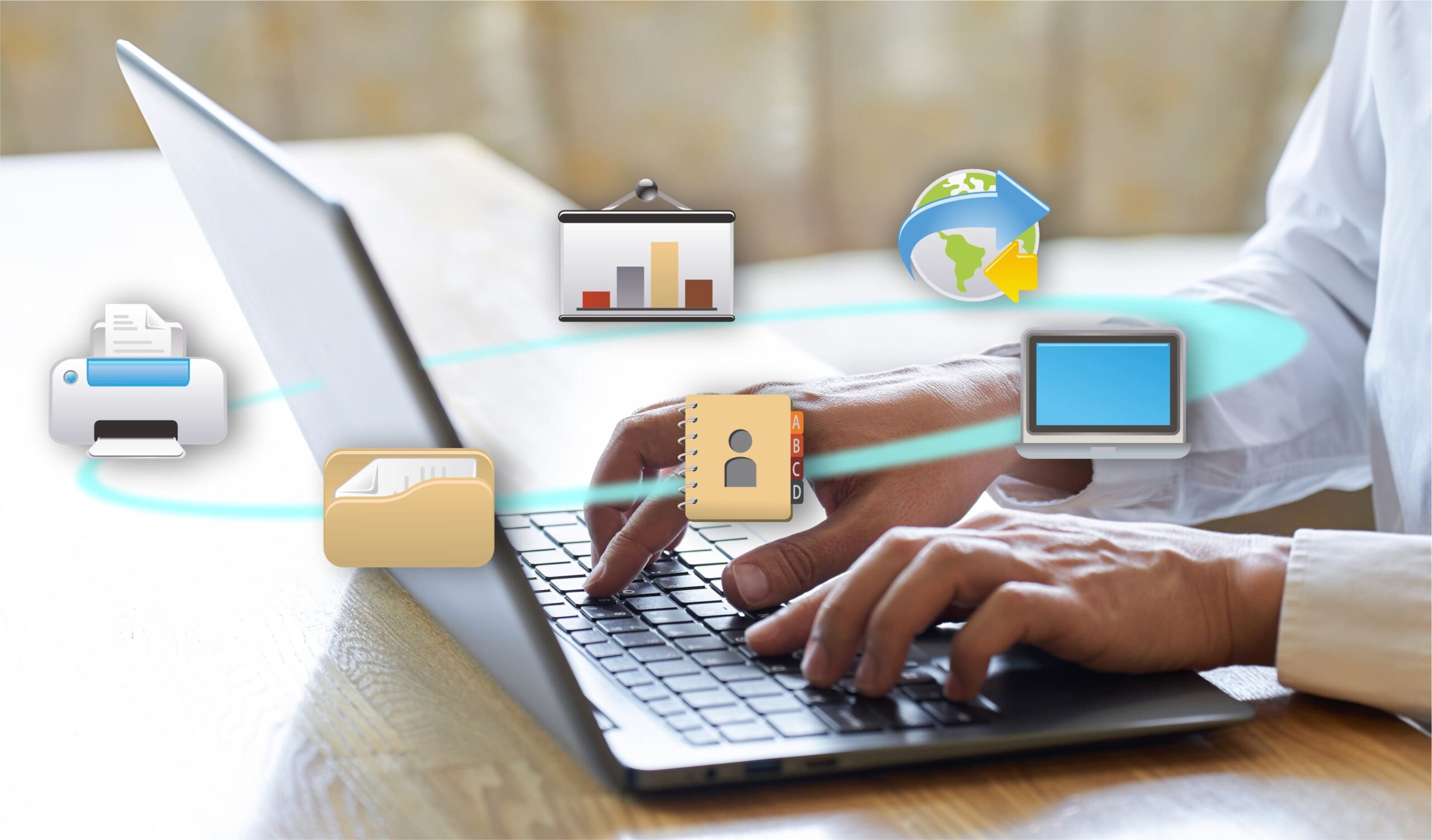 Una persona trabajando en un portátil con diferentes emoticos sobresaliendo