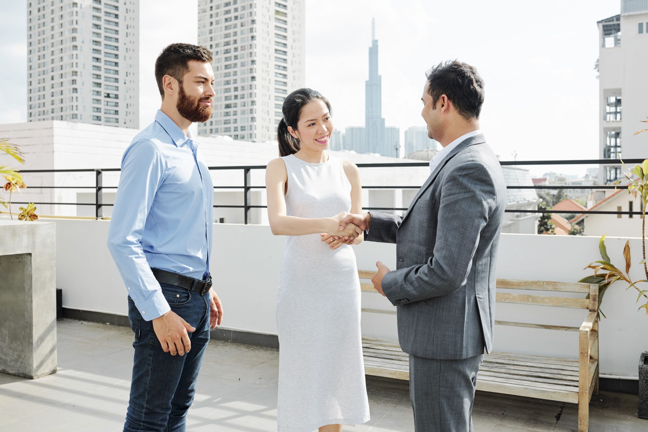 a group of people shaking hands