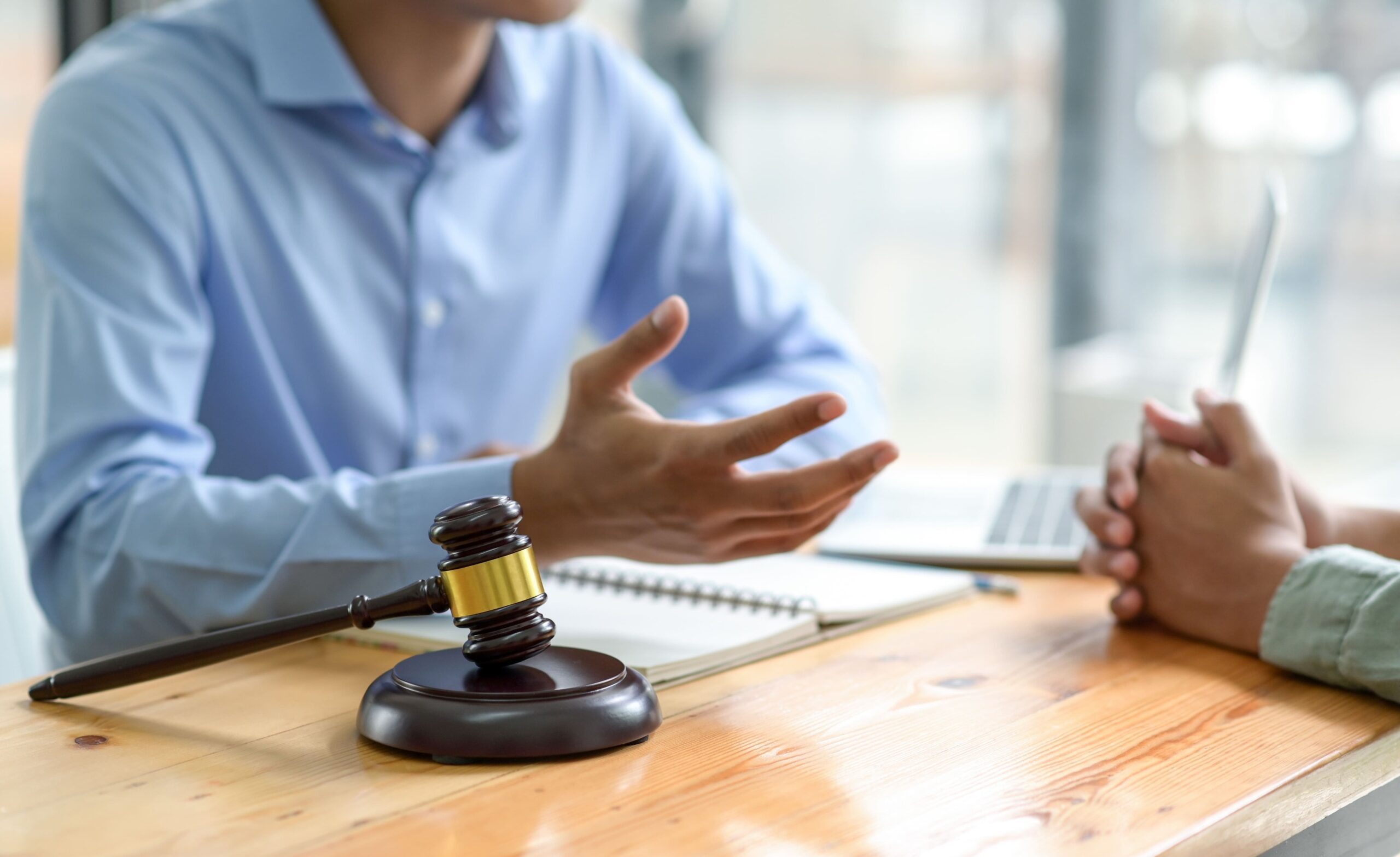 a person talking to a judge