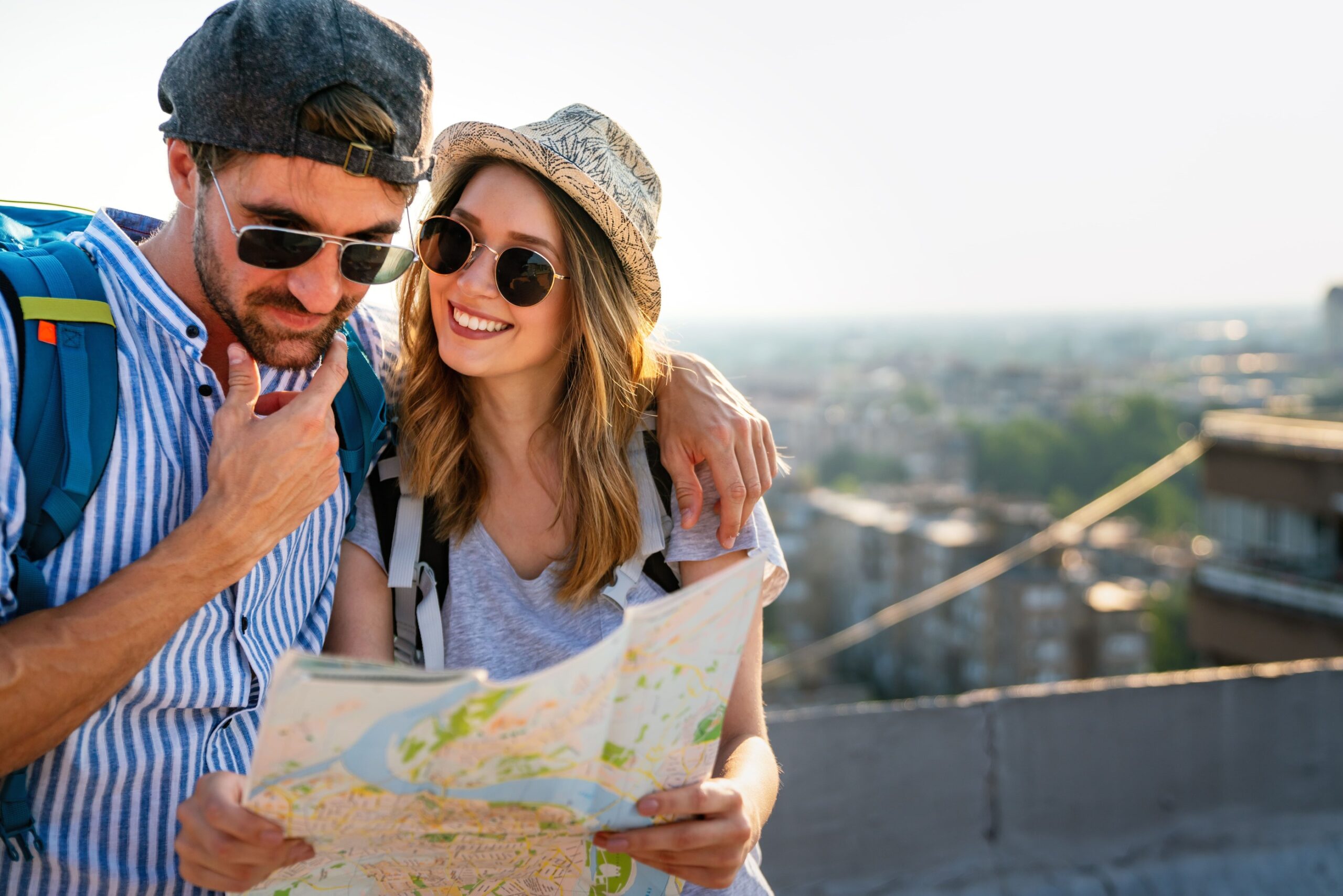 a man and woman looking at a map